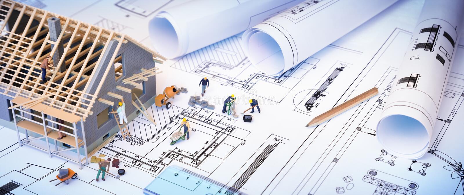 house-under-construction-blueprints-building-project-53360048